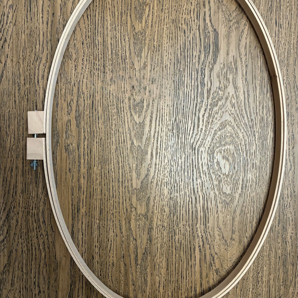 Dritz 18" x 27" Oval Wooden Hoop, likely used for quilting or embroidery.